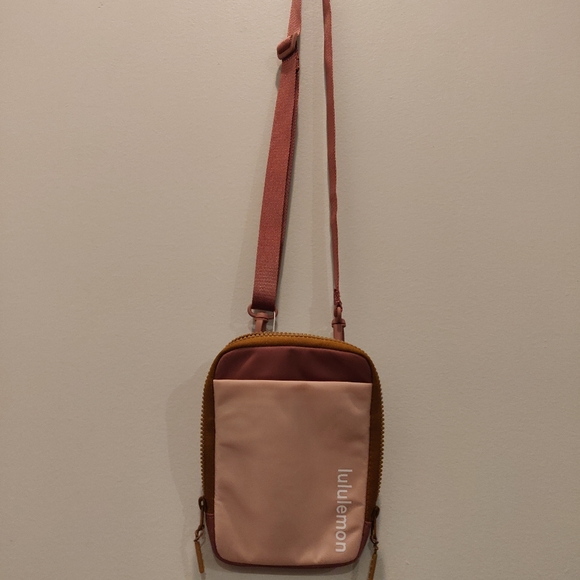 lululemon athletica Handbags - Lululemon NWT Easy access Crossbody bag Precocious Pink/Spiced Chai color